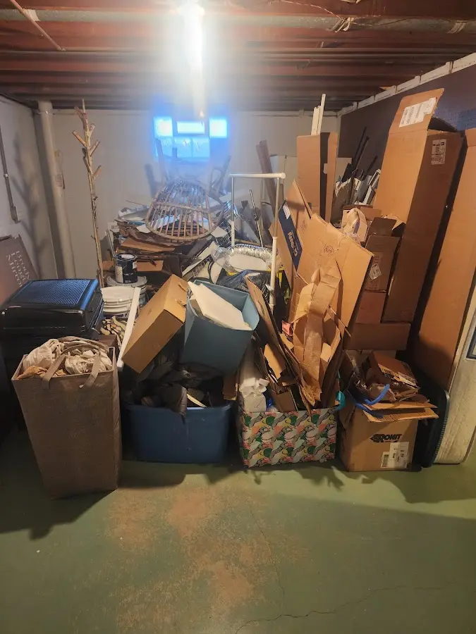 Roll-off dumpster container at job site for 15 Yard Dumpster Rental in Harvard